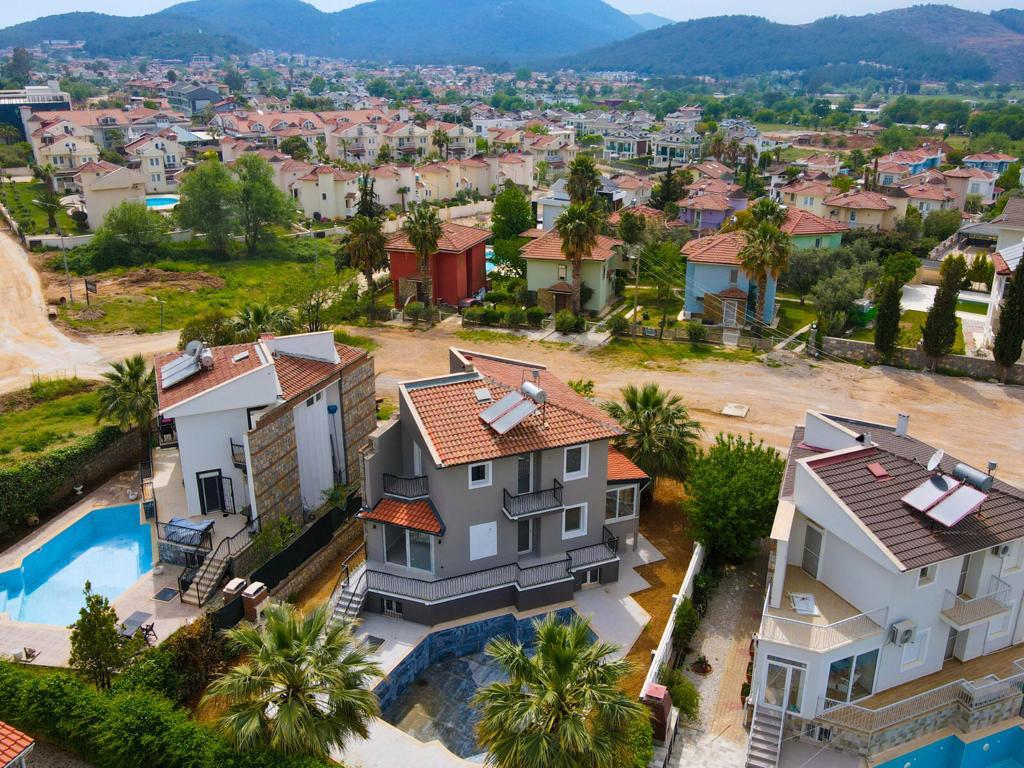 4 bedroom Property in Ovacik for sale. Villa Grey.